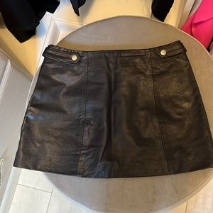Black leather mini skirt